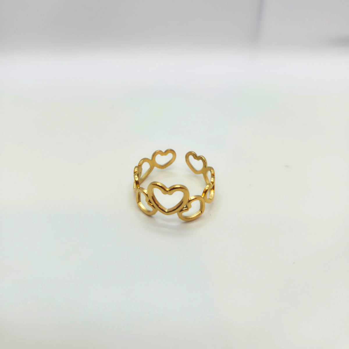 Bague Cœurs entrelacés – 100 % acier plaqué or 18 carats. Ajustable.