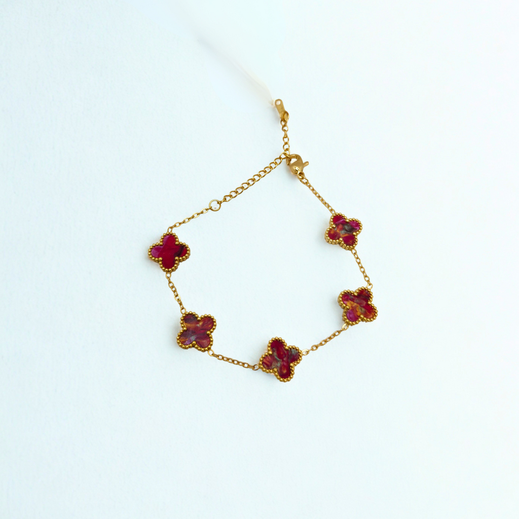 Pulsera de Trébol Tonalidad Vino con Oro 100% Acero Bañado en Oro 18K