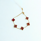 Pulsera de Trébol Tonalidad Vino con Oro 100% Acero Bañado en Oro 18K