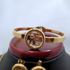 Conjunto de Joyería Circular con Detalles Grabados 100% Acero Bañado en Oro 18K