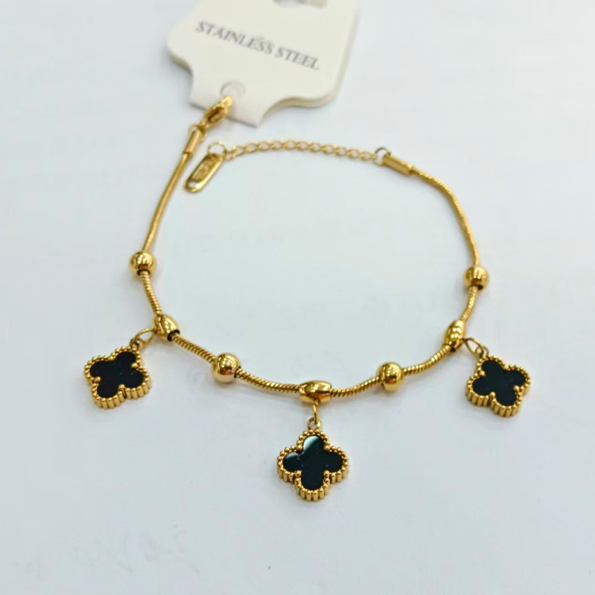 Bracelet trèfle à quatre feuilles noir et chaîne à billes - Acier inoxydable plaqué or